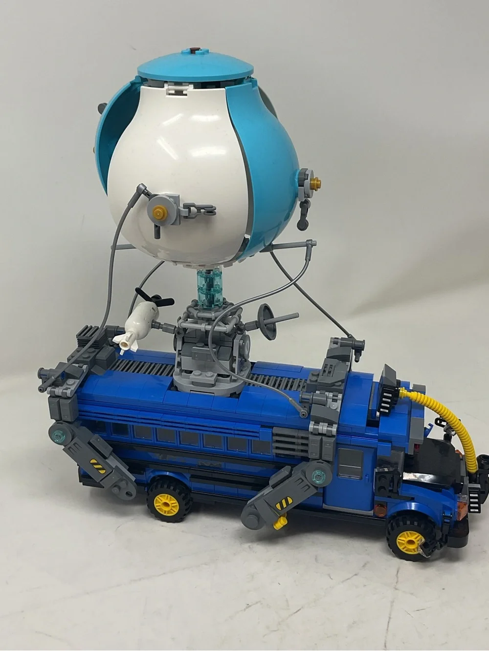 LEGO Blue and White Fortnite Battle Bus with Yellow Accents